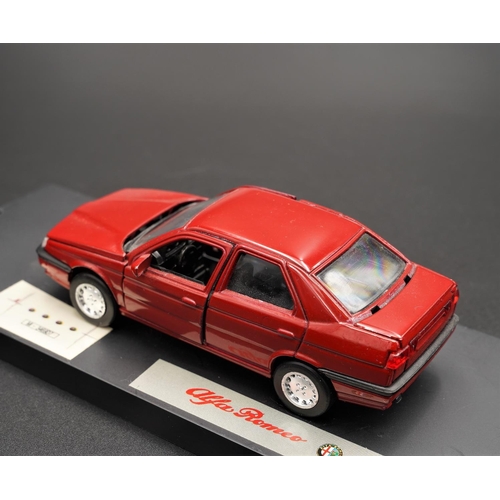 330 - ALFA-ROMEO 155 IN RED BY ALFA-ROMEO SCALE MODELS  Diecast metal with plastic components.