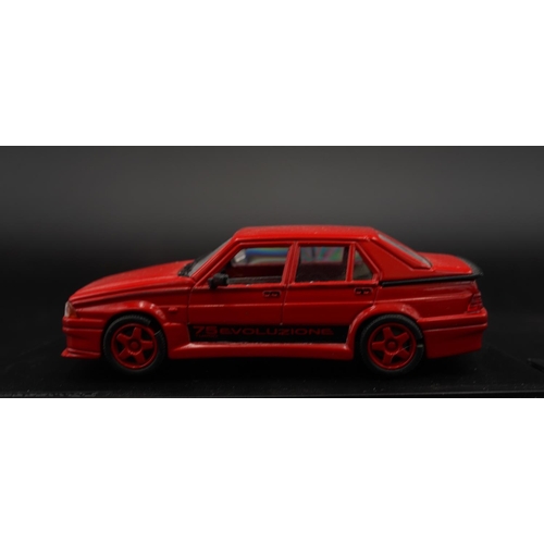 65 - 1987 ALFA-ROMEO 75 EVOLUZIONE STRADALE IN ROSSO BY PROGETTO K   Catalogue number PK203. Diecast meta... 