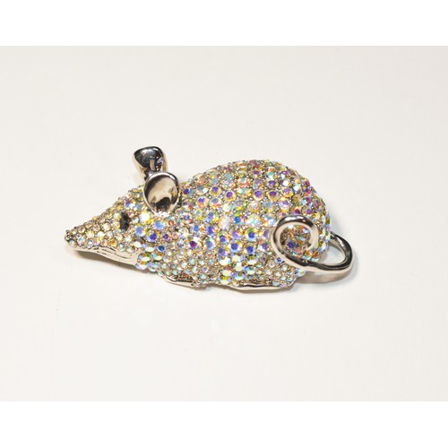 212 - A BUTLER AND WILSON IRIDESCENT STONE MOUSE BROOCHwith black stone set eye in white coloured metal. M... 