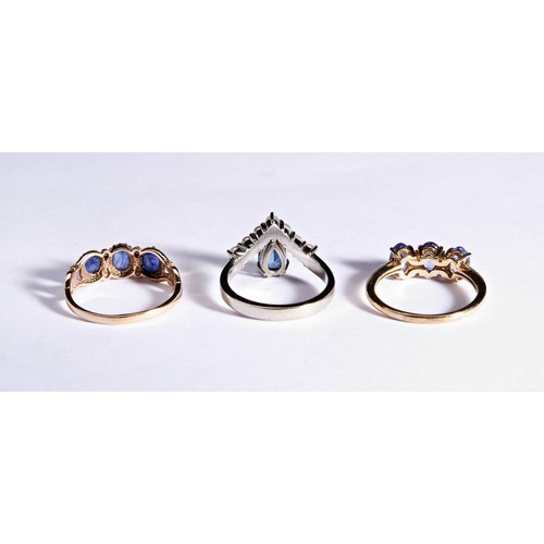 226 - THREE DRESS RINGSA blue stone and cultured pearl tiara shaped ring, set in white gold.Marked 9ctRing... 