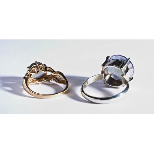 240 - TWO MULTI COLOURED GLASS SET RINGSOne set in silver.Marked 925Ring size RWeight 6.4gmsOne set betwee... 