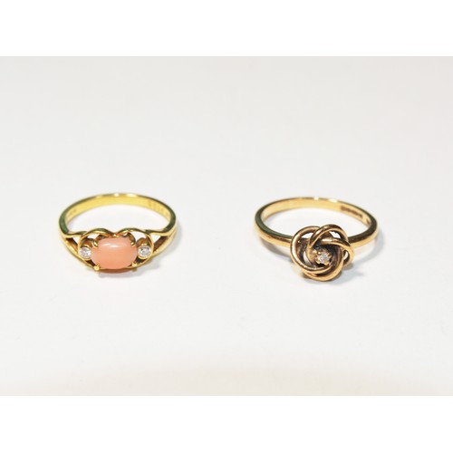 260 - TWO DIAMOND SET GOLD RINGS, CIRCA 1890A gold ring set with a coral cabochon and two round cut diamon... 