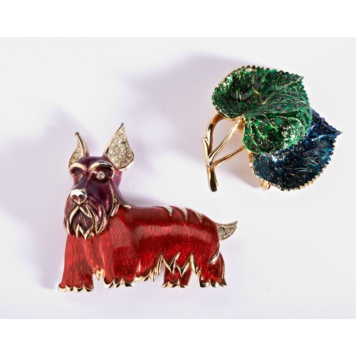 268 - TWO COSTUME BROOCHESA brooch in the form of a Scottie dog set with paste in enamelled base metal. Ma... 