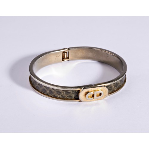 298 - A COLLECTION OF BRACELETSincluding a white metal hinged bangle set with shagreen, the front with CD ... 