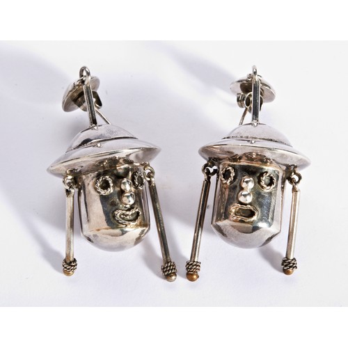 310 - A PAIR OF DOLLS HEAD SILVER EARRINGSstylised doll head shaped earrings with rope work eyes and mouth... 