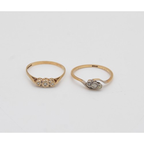 222 - TWO DIAMOND THREE STONE RINGS one an asymmetric three stone diamond ring inscribed 