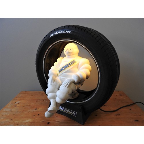 114 - PROMOTIONAL ILLUMINATED MICHELIN MAN WITH TYREBelieved to date from the 1980s, featuring an illumina... 