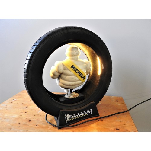 114 - PROMOTIONAL ILLUMINATED MICHELIN MAN WITH TYREBelieved to date from the 1980s, featuring an illumina... 