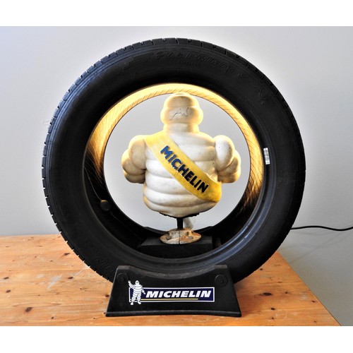 114 - PROMOTIONAL ILLUMINATED MICHELIN MAN WITH TYREBelieved to date from the 1980s, featuring an illumina... 