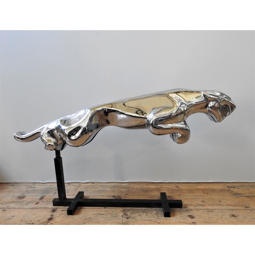 91 - PERIOD JAGUAR PROMOTIONAL CHROME-PLATED FIGUREA leaping Jaguar showroom figure, constructed from an ... 