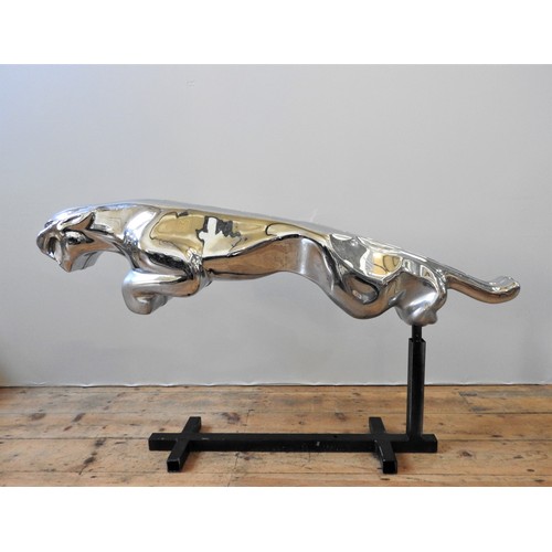 91 - PERIOD JAGUAR PROMOTIONAL CHROME-PLATED FIGUREA leaping Jaguar showroom figure, constructed from an ... 