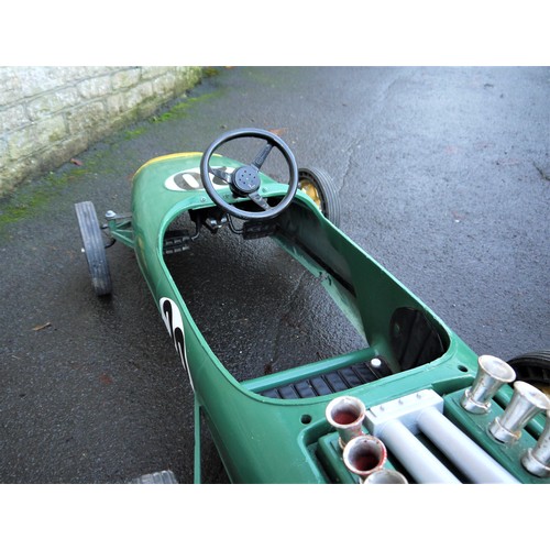 68 - 1960s LOTUS RACING PEDAL CAR BY TRI-ANGIn moulded plastic, circa 1970, finished in British racing gr... 