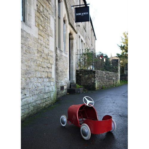 76 - PEDAL CAR BY TOREKSwedish, c. 1950s, restored and in lovely condition, finished in bright red with m... 