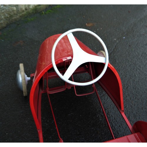 76 - PEDAL CAR BY TOREKSwedish, c. 1950s, restored and in lovely condition, finished in bright red with m... 