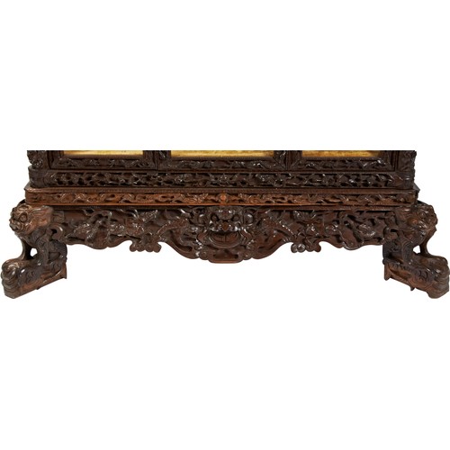 132 - IMPRESSIVE CARVED HARDWOOD 'PAGODA' FORM CABINETQING DYNASTY, 19TH CENTURYthe double-tiered pagoda-f... 