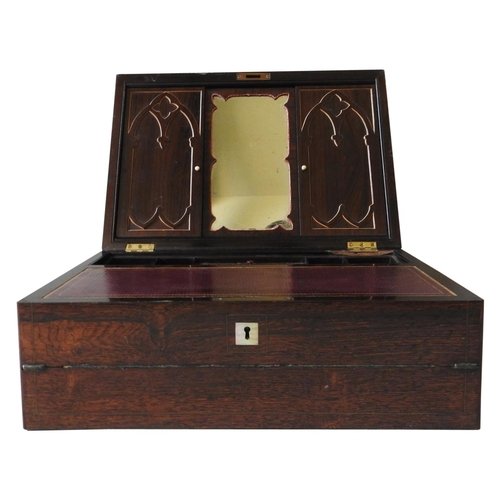 428 - AN INERESTING WILLIAM IV ROSEWOOD WRITING SLOPE, the case with brass line inlay folding out in three... 