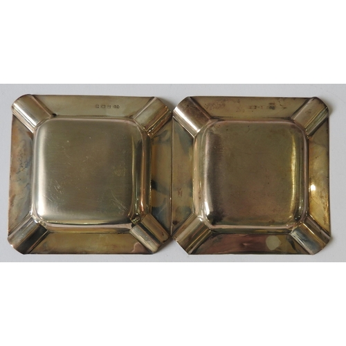 463 - A PAIR OF SQUARE SILVER TRAYS, recessed corners and centre, engine turned border pattern, mark of S ... 