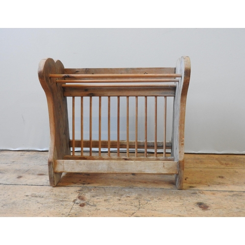 138 - A VINTAGE PINE PLATE  RACK, of simplistic rustic form(49cm high, 51cm wide, 20cm deep)