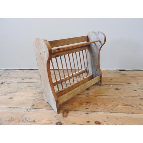 138 - A VINTAGE PINE PLATE  RACK, of simplistic rustic form(49cm high, 51cm wide, 20cm deep)