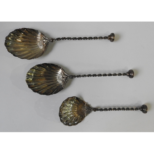 519 - A PAIR OF SILVER 'BERRY' SPOONS, London, 1899, by Mappin & Webb, with gadrooned bowls and twist ... 