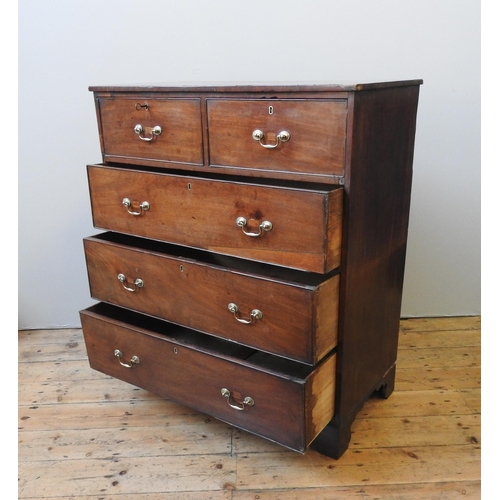 1 - A GEORGE III MAHOGANY CHEST OF DRAWERS, two short drawers over three long drawers, raised on bracket... 