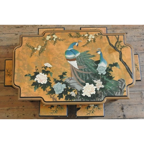14 - A CHINESE LACQUER TABLE AND SIX STOOLS, decorated with two peacocks perched amongst flowering branch... 