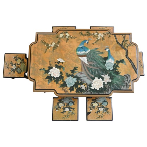 14 - A CHINESE LACQUER TABLE AND SIX STOOLS, decorated with two peacocks perched amongst flowering branch... 