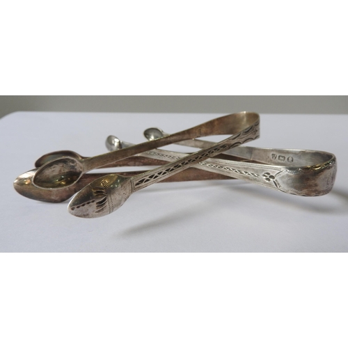 480 - THREE PAIRS OF GEORGIAN SILVER SUGAR TONGS, including:two bright cut decorated pairs of tongs, one p... 