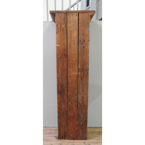 67 - A RUSTIC RECLAIMED PINE NARROW CUPBOARD, of simplistic form, with single door, 186 x 60 x 30.5 cm