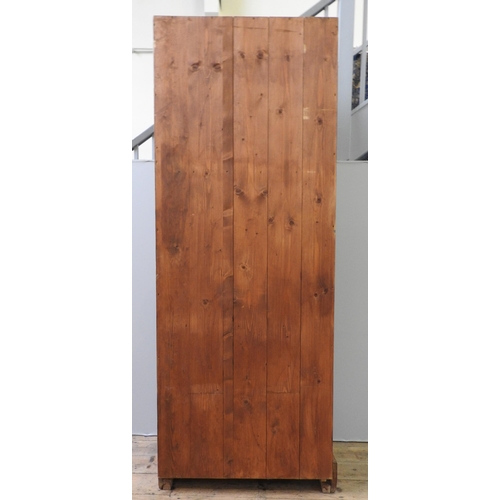 77 - A RUSTIC RECLAIMED PINE KITCHEN CUPBOARD, two mesh panelled doors enclosing three interior shelves, ... 