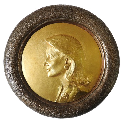 330 - RAPHAEL CINDONCHA (b.1952) GILT BRONZE PORTRAIT RELIEF PANEL, mounted in a circular hammered bronze ... 