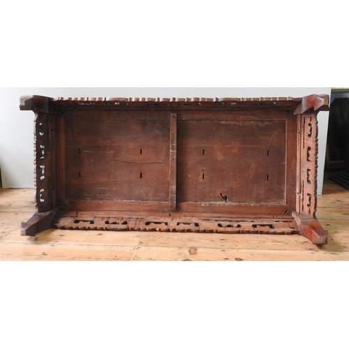 124 - A CHINESE HARDWOOD LOW TABLE, with pierced carved frieze, 30 x 150 x 70 cm