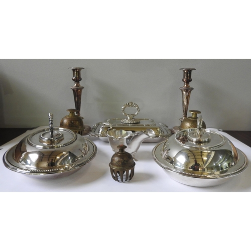 467 - THREE SILVER PLATED SERVING DISHES, A PAIR OF SILVER PLATED CANDLESTICKS AND A SAUCEBOAT, along with... 