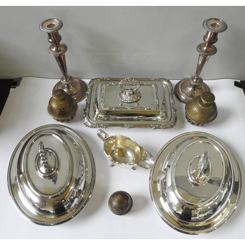 467 - THREE SILVER PLATED SERVING DISHES, A PAIR OF SILVER PLATED CANDLESTICKS AND A SAUCEBOAT, along with... 