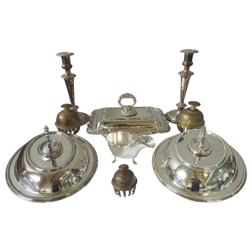 467 - THREE SILVER PLATED SERVING DISHES, A PAIR OF SILVER PLATED CANDLESTICKS AND A SAUCEBOAT, along with... 