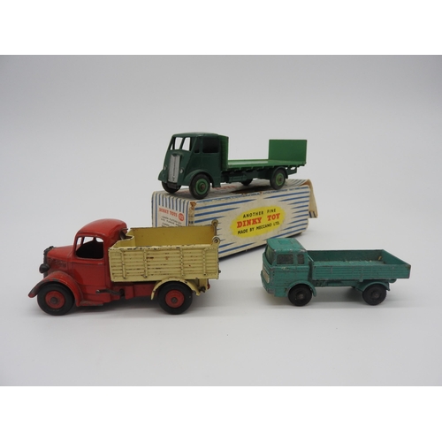 298 - A DINKY TOYS 513 GUY FLAT TRUCK WITH TAILBOARD, (boxed), along with a Lesney Matchbox Mercedes Truck... 