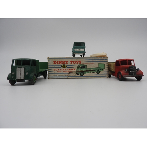 298 - A DINKY TOYS 513 GUY FLAT TRUCK WITH TAILBOARD, (boxed), along with a Lesney Matchbox Mercedes Truck... 