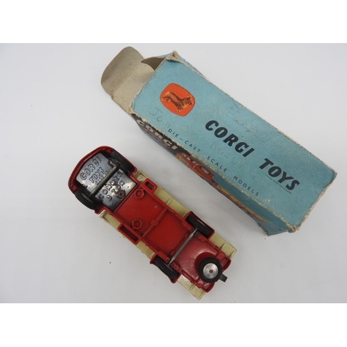 292 - A CORGI TOYS 452 COMMER 5 TON DROPSIDE LORRY, boxed (in damaged box), along with a Dinky Toy wheel b... 