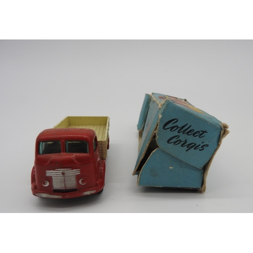 292 - A CORGI TOYS 452 COMMER 5 TON DROPSIDE LORRY, boxed (in damaged box), along with a Dinky Toy wheel b... 