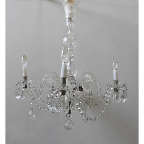 151 - A LARGE GLASS CHANDELIER, comprised of four down swept spiral twist branches with glass drip trays a... 