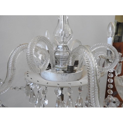 151 - A LARGE GLASS CHANDELIER, comprised of four down swept spiral twist branches with glass drip trays a... 