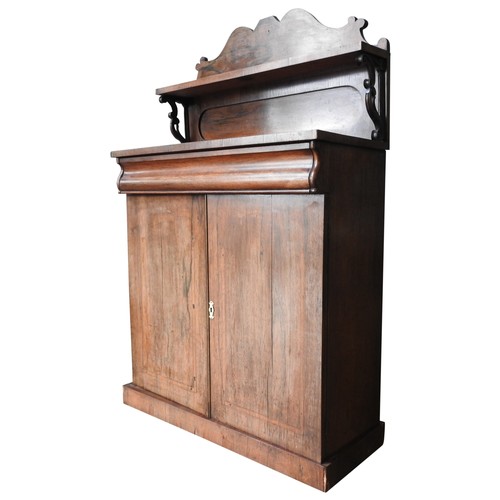 42 - A VICTORIAN ROSEWOOD CHIFFONIER, a fret cut gallery back with upper shelf with scroll supports, one ... 