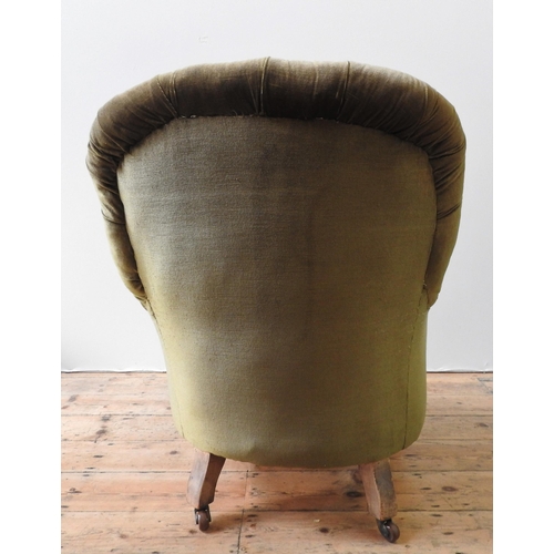55 - A 19TH CENTURY BUTTON UPHOLSTERED TUB CHAIR, covered in an emerald green material, raised on tapered... 