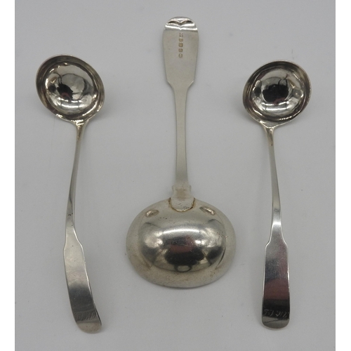 496 - A PAIR OF SCOTTISH SILVER SAUCE LADLES AND A LARGER SILVER SAUCE LADLE, the Scottish pair bears the ... 