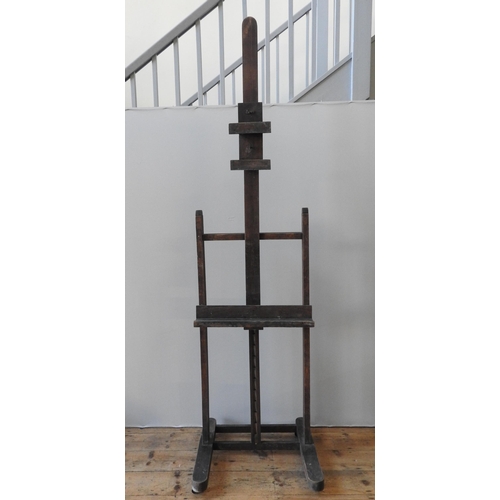 80 - A FRENCH 19TH CENTURY BOURGEOIS-AINE ARTIST'S EASEL, adjustable clamps and shelf, on four casters, w... 