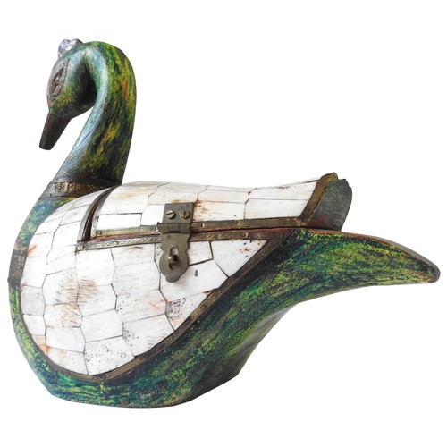 427 - A PAINTED HARDWOOD TRINKET BOX IN THE FORM OF A SWAN, with gilt metal mounts, the wings inset with b... 