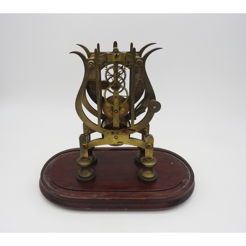 180 - A 19TH CENTURY BRASS FUSEE SKELETON CLOCK, 11 cm dial with Roman numerals, the scrolling plates unit... 