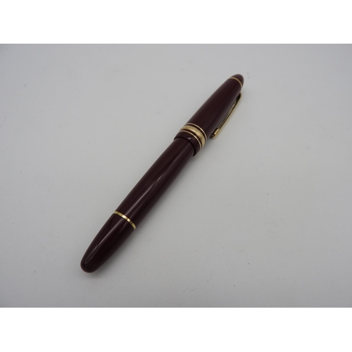 445 - A MONT BLANC MEISTERSTUCK FOUNTAIN PEN, dark red coloured body, the nib marked '4810 MB 14k MONT BLA... 