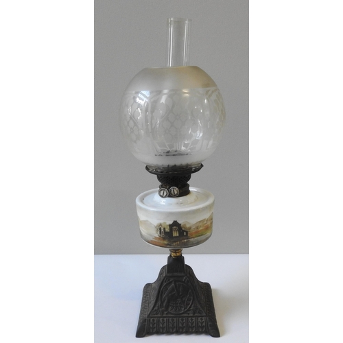 152 - A 19TH CENTURY OIL LAMP, with etched glass globular shade, glass chimney, a painted glass reservoir ... 