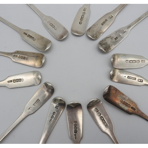 523 - A COLLECTION OF FOURTEEN SILVER FIDDLE TEA SPOONS, some with rat tail pattern, all with either Dubli... 